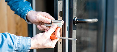 Person Changing the Locks of Their New Home