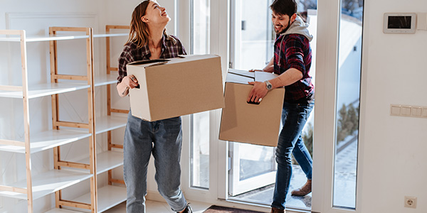 Couple Moving In to New House