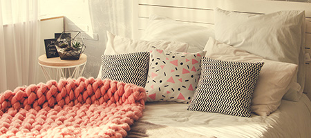 Cozy Bedroom With Pink and White Accents