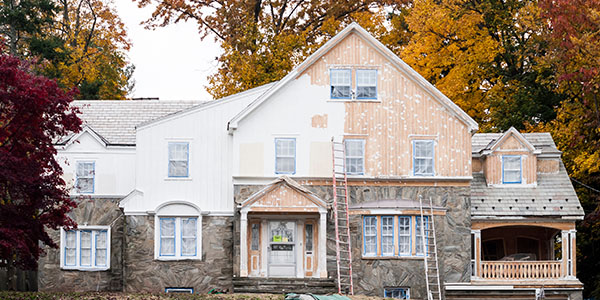 Exterior of House Going Through Renovations and Painting