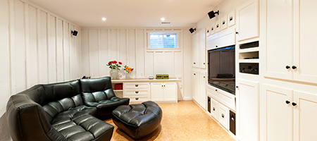 Finished Basement With Black Leather Couch