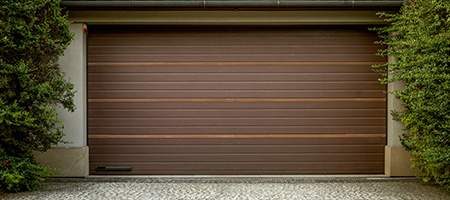 A newly replaced garage door for a more modern exterior look.