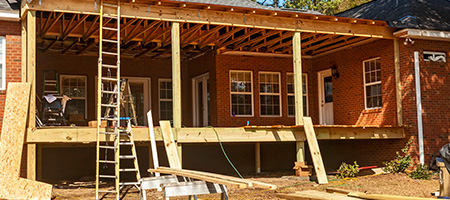 A new porch being added to a house. 