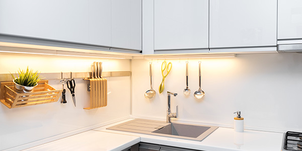 White Kitchen Corner With Worktop Lighting