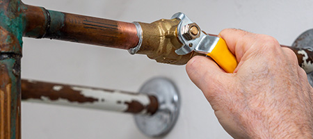 Homeowner Using Their Shutoff Valve