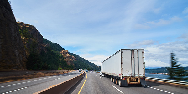 Moving Truck Driving on Highway