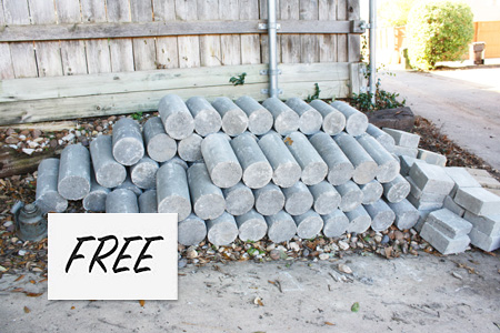 Concrete blocks outside with a free sign. 
